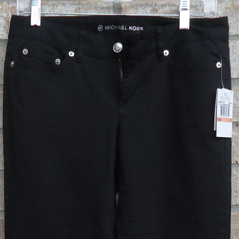NWT. SIZE 2. MICHAEL MICHAEL KORS black bootcut jeans .